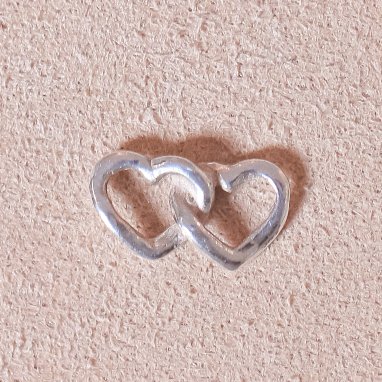 Intertwined Charm