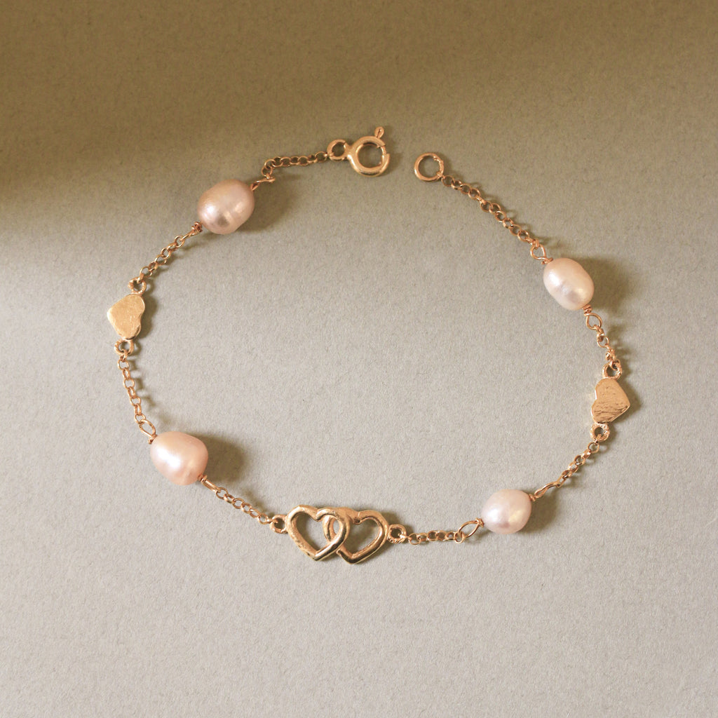 Intertwined with Charms Bracelet